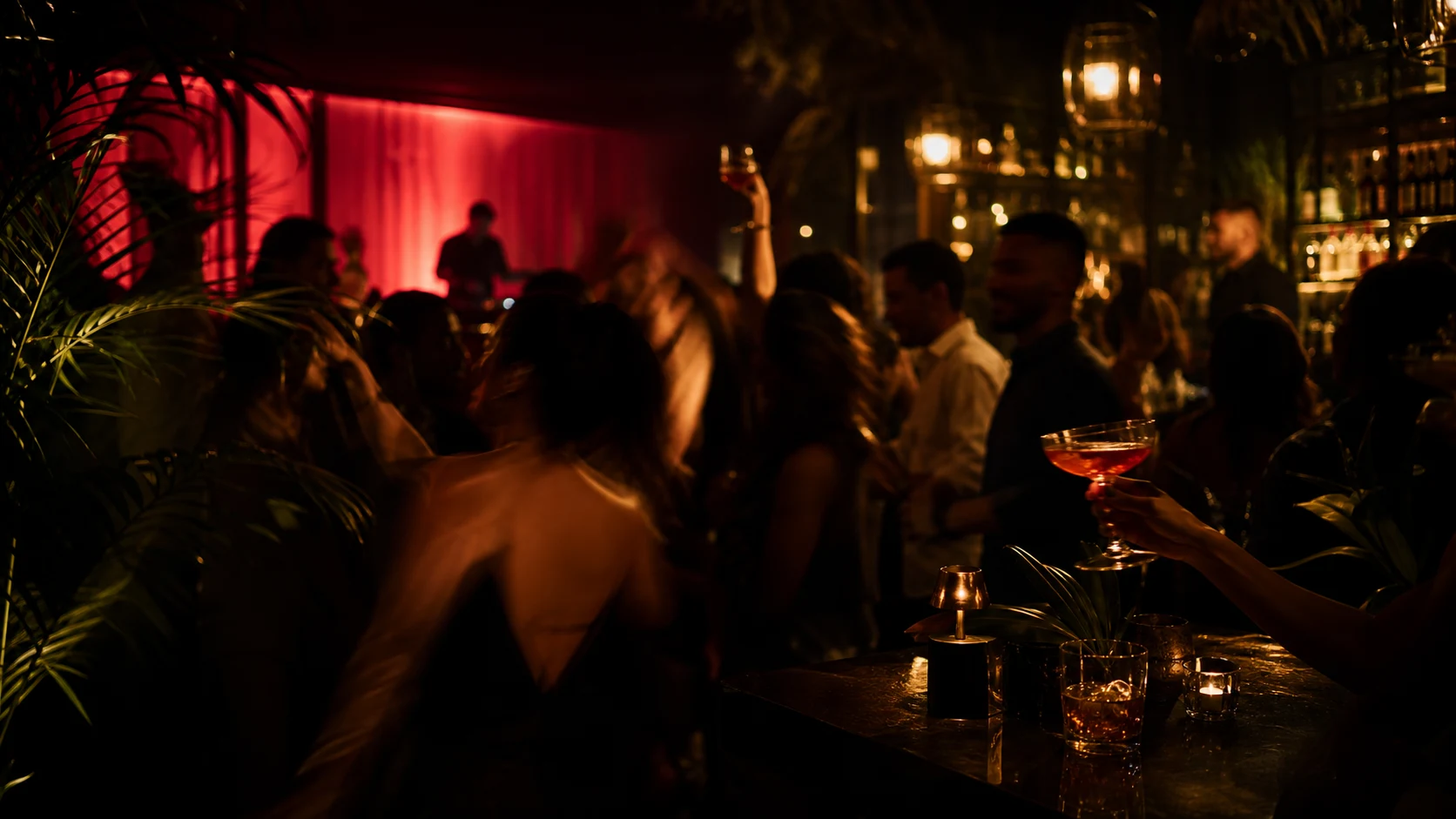 Energetic late-night Sobre Mesa lounge scene with cocktails, music, and motion blur